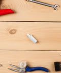 Killer Quality 50 Pack Shutter Repair Pins spring loaded plantation shutter fasteners on wooden surface with tools.