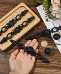 Five Piece Vintage Black Drawer Pulls Set With 0 98 Inch Center To Center Zinc Alloy Cabinet Knobs displayed on table