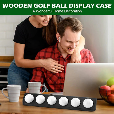 Wooden Golf Ball Display Case Black Wall Mount Holder Shelf For Collectors shown on table with couple in background