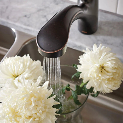 Brecklyn Mediterranean Bronze Single Handle Pull Out Sprayer Kitchen Faucet With Power Clean Tech washing white flowers