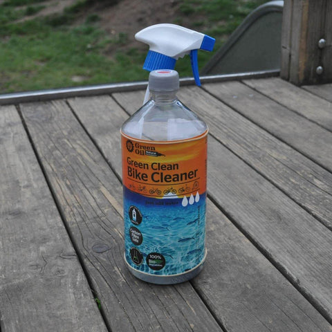 Palm Oil Free Bike Cleaner And Wet Chain Lube Bundle For All Weather Riding Made In UK With A Non Freezing Formula That Stays Effective To Minus 11 Degrees Eco Friendly Odor Free Keeps Chains Clean And Lubricated In Wet Or Snowy Trails bottle on wood surface