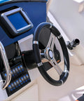 Boat cockpit with Weatherproof 20A 12V 5 Pin SPST On Off Rocker Switch For Satellite Internet Dishes, mounted near steering wheel.