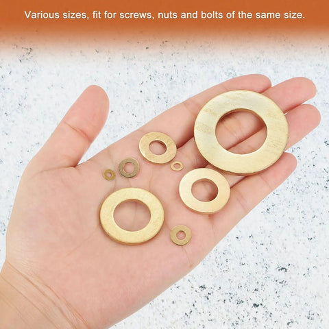 Brass Flat Washers M6 Set, 14mm OD, 1mm Thick, 100 Pack, Rust-Resistant Seal Rings For Screws Bolts Nuts, Great For Auto, Marine, And DIY Projects Everyday Use, assorted brass washers in hand