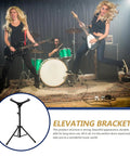 Heavy Duty Adjustable Snare Drum Stand Tripod Rack With Foldable Alloy Brackets Portable Black Practice Platform in a dynamic band setting.