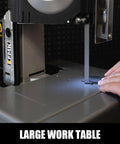 Close-up of a 10 Amp Variable Speed Metal Band Saw With Large Workbench, 5 Inch Cutting Capacity And Adjustable Speed From 137 To 472 FPM in use