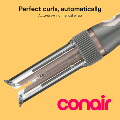 Close-up of InfinitiPRO Curl Secret Ceramic Auto Curling Iron With Three Quarters Inch Barrel for salon curls on yellow background