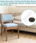 7.5 Inch Quick Fancy Nailer Spacer Set With Two White Spacers And 200pcs Antique Bronze Round Decorative Nails For Furniture Renovation on a chair.