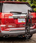 XTC2 Tilt Hitch Mount Bike Rack For Two Bikes With Platform Carrier on SUV, folded position, sturdy lightweight design