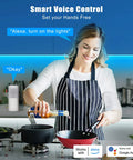 Woman using voice control with Alexa for RGBWW Smart LED Strip Lights 32.8ft Tunable White 3000K To 6500K Plus RGB WiFi Color Changing Strips Work With Alexa Google Assistant Music Sync For Kitchen Bedroom Cabinet And Home Theater in modern kitchen.