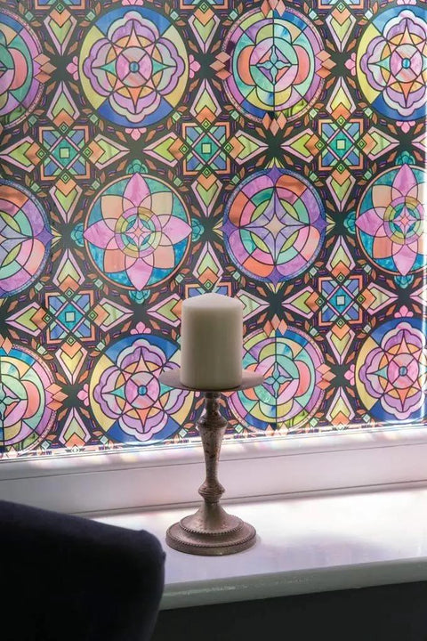 Colorful stained glass window privacy film with Lancaster design and candle on windowsill, 26.5 x 59 inches