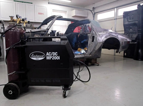 Elite 200 Amp All In One Multi Process AC DC Welder MP200i in a garage welding car frame