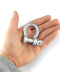 Shackles With Screw Pins Grade 43 3/8 Inch 10 Pack 4,000 Pound Safe Working Load shown in hand for scale.