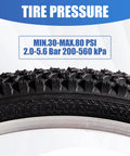 Close-up of tread pattern on Two Pack 24x1.95 Mountain Bike Tires Set Folding Puncture Proof Off Road Ready, showing tire pressure limits.