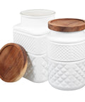 Top Shelf Matte White Glass Storage Jars With Lids Two Pack For Kitchen Organization Airtight Canisters with wood tops and textured design.