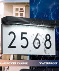 Solar Powered Address Plaque With LED Illumination, Waterproof Outdoor House Number Sign lit under stormy rain conditions