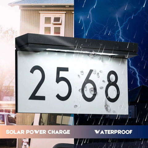 Solar Powered Address Plaque With LED Illumination, Waterproof Outdoor House Number Sign lit under stormy rain conditions