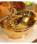 Countertop Bathroom Sinks Ceramic Wash Basin Golden Sink with elegant faucet, perfect for luxury bathroom vanity decor.