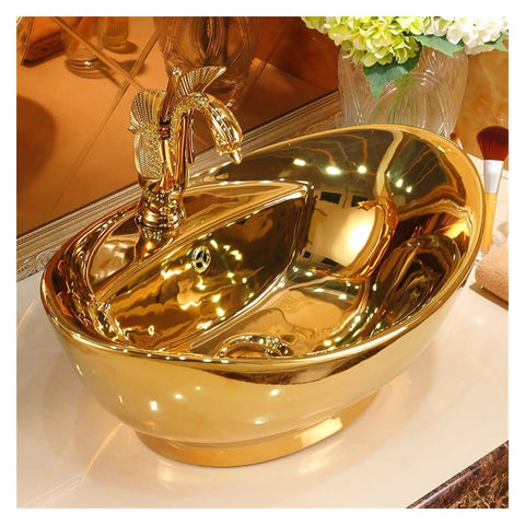 Countertop Bathroom Sinks Ceramic Wash Basin Golden Sink with elegant faucet, perfect for luxury bathroom vanity decor.