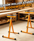 Badass Heavy Duty Roller Stand With 3 In 1 Adjustable Head And 250 Lbs Capacity Chrome Steel Workhorse Pro Jobsite Essential For Moving Roll Goods Effortlessly. Two premium roller stands in a workshop supporting a wooden board.