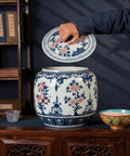 Large Ceramic Rice Jar And Flour Bin With Snap Lock Airtight Lids Authentic Chinese Good Fortune Design being opened.