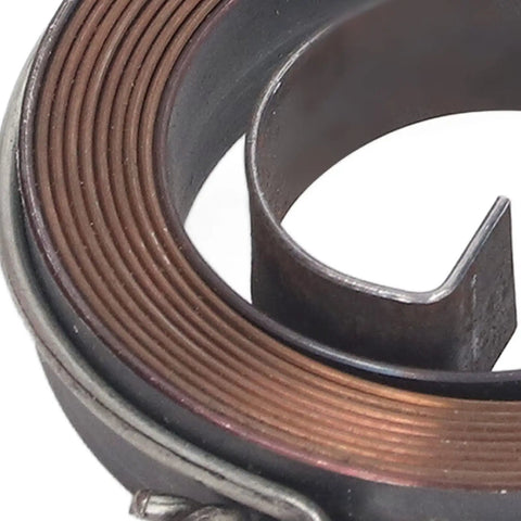 Close-up of Two Piece Drill Press Return Spring Set made from spring steel, showing heavy duty feed return coil for bench drilling.