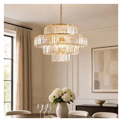 Luxury Gold K9 Crystal Chandelier Modern LED Pendant Light Energy Saving Lamp hanging above dining table with flowers.