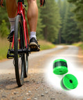 Cyclist on trail with Mountain Bike Tire Liner Inner Tube Flat Protector Pair For 24in 26in 29in, green polyurethane barrier visible