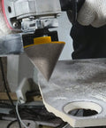 Beveling Chamfer Drill Bit for Enlarging Holes in Tile Marble Glass Ceramic Granite 1-7/8 Inch Diameter in use on stone surface