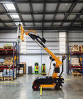 Heavy Duty Electric Vacuum Glass Lifter Robot Featuring Hydraulic Arm And Killer Suction Cups For No Sweat Commercial Glass Moving and Super Quick Site Installation Workhorse in warehouse.