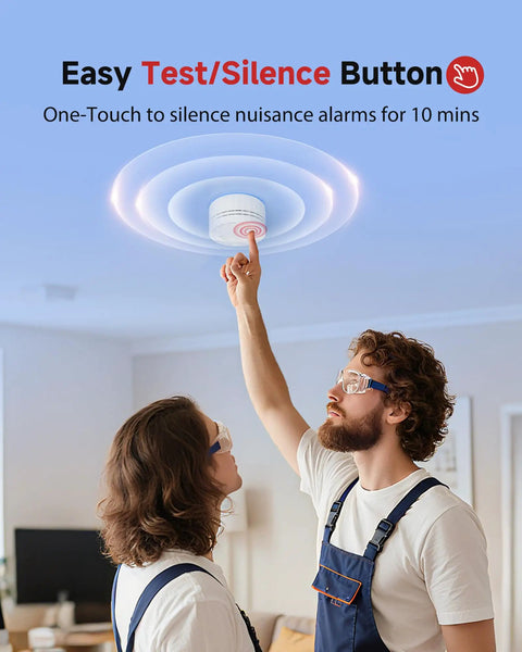 A couple using the easy test/silence button on the No Sweat Photoelectric Smoke Detector for home safety; battery powered.