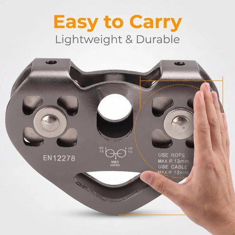 Zipline Pulley Trolley Rescue System With Dual Speed Pulleys 30kN 6700Lbs Heavy Duty Rigging shown with hand for size reference