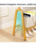 Close-up of the bottom triangular structure of Beefy Free Standing Metal Clothes Rack With Shelves For Boutique Or Home Use Black 60x33x147cm