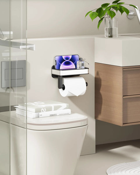 Toilet Paper Holder With Top Shelf And Phone Storage Adhesive And Screw Wall Mount Matte Black Bathroom Organizer in washroom.