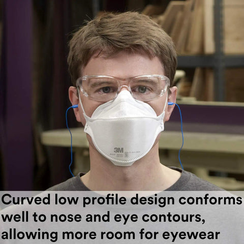 Person wearing Aura Particulate Respirator 9210 Plus N95 Disposable Mask Pack Of 20 For Dust And Smoke Keeps Eyewear From Fogging