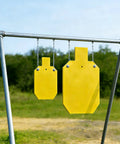 Ar500 Steel Silhouette Target 7 By 12 Inches Half Inch Thick for Rifle Practice hanging outdoors