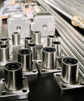Pro Grade Lmk8Uu Linear Ball Bearings with 8mm bore and 15mm outer diameter on a work surface.