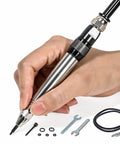 Precision Pneumatic Engraving Pen And Air Scribe Tool For Metal Ceramic Glass Etching With Adjustable Speed And Tough Alloy Tip in use, hand holding, shows tools and accessories.