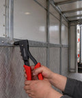 Heavy Duty Pop Rivet Gun Kit Workhorse With 120 Pieces Rivets And 4 Interchangeable Heads in use on metal panel