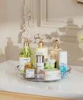 Clear Two Pack Rotating Lazy Susan Turntable For Kitchen Cabinets And Fridge Shelves Smooth Swivel Action, holding skincare products.