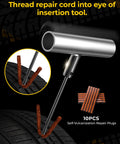 Pro Grade Tire Repair Kit With Plugs For Punctures And Flats, tool threading plug into tire puncture on black tire