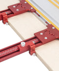 Close-up of the Built Like A Tank Dual Track Saw Parallel Guide System on wood, showcasing anodized aluminum rails for precise cuts.