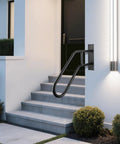 Heavy Duty U Shaped Wall Mount Stair Handrail For Indoor Outdoor Porch Steps Non Slip Safety Grab Bar mounted on exterior wall by steps.
