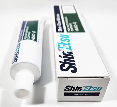 Front view: Shin-Etsu HIVAC-G silicone grease tube (3.5 oz/100 g) with green label and branded white box.