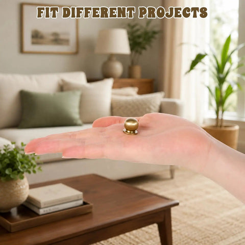 Real Deal Quality Top Shelf Solid Brass Mini Knobs One Half Inch Gold Drawer Pulls in hand, showcasing size and design for projects.