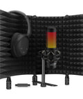 Top Shelf Microphone Isolation Shield With Snap Fit Pop Filter Kicks Room Noise Under The Bus Using Thicker Insulating Foam in a collapsible design.