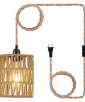 Straight Up Chic Boho Woven Rattan Plug In Pendant Ceiling Light with braided cord and switch, 47 inch wide shade, casting warm light.