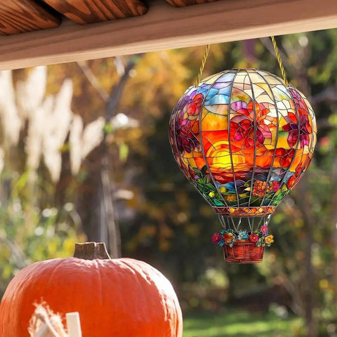 Colorful stained glass hot air balloon sunlight catcher hanging outdoors