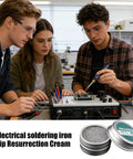 Group using Pro Grade Soldering Tip Tinner And Oxidation Removal Paste for electronics repair on circuit boards.