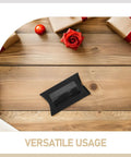 50 Pack Black Kraft Paper Pillow Gift Boxes With Window For Birthday Parties And Events on wooden table with decor