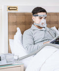 Person using 2 Pack CPAP Hose Universal Tubing Six Foot 72 Inch 22mm Ends Fits Most CPAP BiPAP and BiLevel Machines in bed